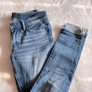 Buckle black skinny jeans